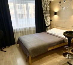 Двухместная студия Comfort (двуспальная кровать) в Апартаменты с балконом и видом На Сутки