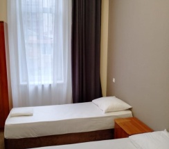 Номер полулюкс с 2 односпальными кроватями в Оптима