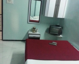 Двухместный номер Deluxe двуспальная кровать в New Metro Guest House