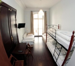 Четырёхместный номер Standard в Pit Stop Hostel