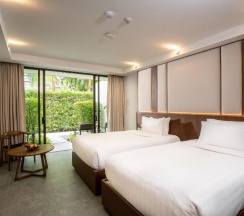 Двухместный номер Deluxe с видом на сад 2 отдельные кровати в Dewa Phuket Resort & Villas