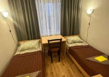 Номер стандарт с 2 односпальными кроватями в RedLine hostel