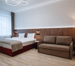 УЛУЧШЕННЫЙ с 1 или 2 кроватями и диваном в Amati Kazan