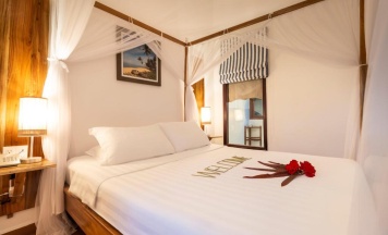 Двухместный семейный коттедж с видом на море двуспальная кровать в Cassia Cottage Resort and Spa
