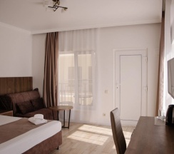 Трёхместный номер Deluxe с балконом и с видом на море в Талион