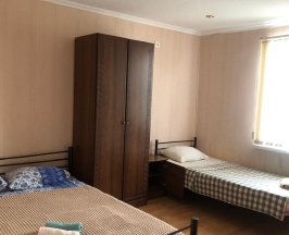 Четырехместный номер с 1 двуспальной или 2 односпальными кроватями в Саучи