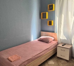 Номер стандарт с 2 односпальными кроватями (общие удобства) в Юность