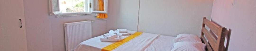 Двухместный номер Deluxe с видом на море двуспальная кровать в Eflatun Konukevi Bozcaada