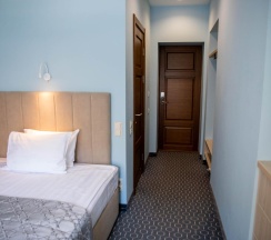 Номер улучшенный стандарт с 1 односпальной кроватью в Хабаровск