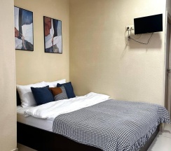 Номер стандарт комфорт с 1 двуспальной кроватью Мираж в Дисней