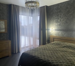 Двухместный коттедж двуспальная кровать в Гостевой дом Небо N 7