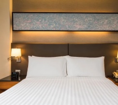 Двухместный номер Deluxe c 1 комнатой с балконом (двуспальная кровать) в Chatrium Sathon Bangkok