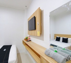 Двухместный номер Deluxe двуспальная кровать в Capital O 93266 Palmier Hotel