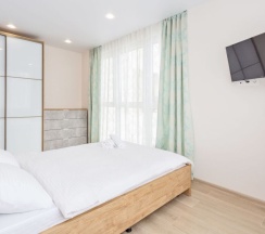 Номер Superior в Квартира на сутки Маяк Минск Метро 5 мин Wi-Fi Кондиционер Кухня объединена с жилой зоной Отдельная спальня Отчётные документы