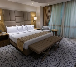 Двухместный семейный люкс Executive (2 отдельные кровати) в Triumph Plaza Hotel