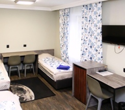 Кровать в общем номере в Тахар