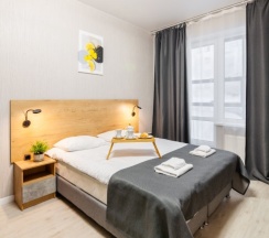 Улучшенная студия с кроватью king size и балконом в Pulkovo Apart