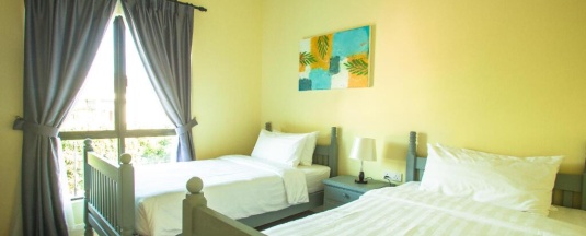 Люкс с 3 комнатами в RPGC Garden Hotel