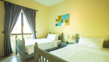 Люкс с 2 комнатами двуспальная кровать в RPGC Garden Hotel