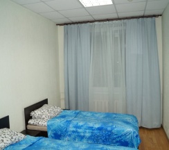 Кровать в общем номере в Натали