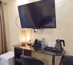 Улучшенный номер с большой круглой кроватью в Скайвью сити