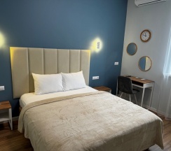 СУПЕРИОР Трехместный номер с двуспальной и односпальной кроватями в Zb Hotels Айсберг Саратов