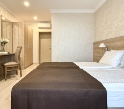 "Стандарт" Стандартный трехместный номер с 2 отдельными кроватями и дополнительным местом в Диона