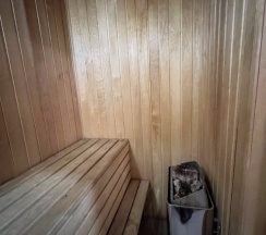 Двухместный номер в деревянном коттедже с сауной и камином в Колыба