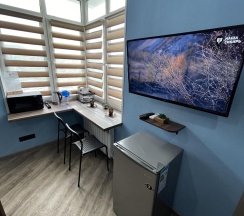 Номер делюкс семейный с 1 односпальной и 1 двуспальной кроватью в Pallada