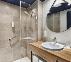 Двухместный номер Comfort 2 отдельные кровати в H2 Hotel München Olympiapark