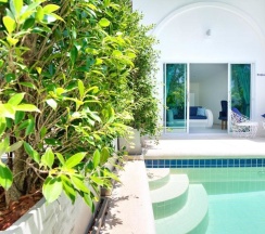 Бунгало с видом на сад в La Perle Luxury Boutique Hotel