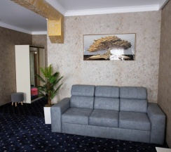 Улучшенный четырёхместный стандартный номер в Хан