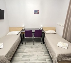 Номер стандарт с 2 односпальными кроватями (цокольный этаж) в Kovensky