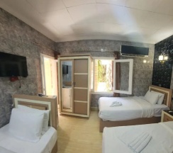 Трёхместный номер Comfort с 3 комнатами с видом на город в Отель Cairo