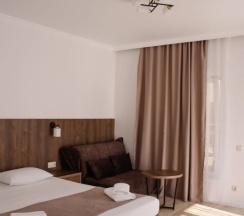 Трёхместный номер Deluxe с балконом и с видом на море в Талион