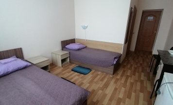 Кровать в 2-местном общем номере в Геолог
