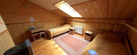 Номер эконом с 2 односпальными кроватями (мансарда) в Торопа