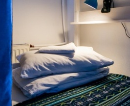 Кровать в четырехместном номере в Maestro Hostel