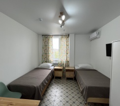 Номер эконом с 2 односпальными кроватями (мансарда) в Домино