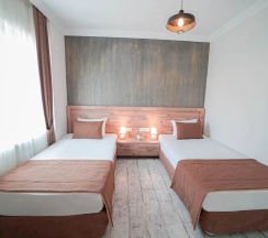 Апартаменты Comfort в Voswos Garage Coffee & Hotel