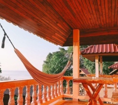 Бунгало Standard с балконом и с видом на море в J.B.Hut Bungalows