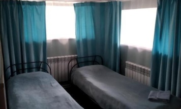 Кровать в 2-местном общем номере в Аура