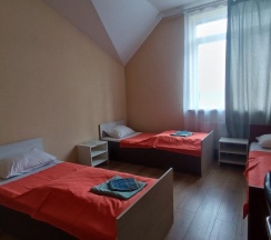 Кровать в 4-местном общем мужском номере в Порт 55