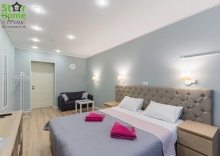 Стильная просторная комната с гостиной зоной. в Star home