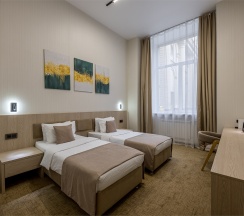Двухместный номер «ДЕЛЮКС» с двумя отдельными кроватями в Riverside Hotel