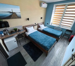 Номер стандарт с 2 односпальными кроватями в Pallada