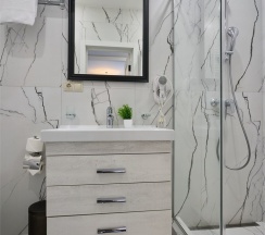 Люкс с террасой и видом на город и море в IL Punto