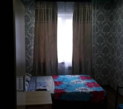Кровать в 4-местном общем номере в Гостиница