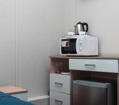 Двухместная комната с 2 односпальными кроватями и общей ванной комнатой в МК Мокко