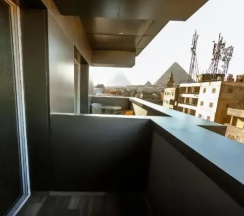 Трёхместный номер Deluxe с видом на пирамиды в Pyramid Edge Hotel & Exclusive Pyramids View Rooftop